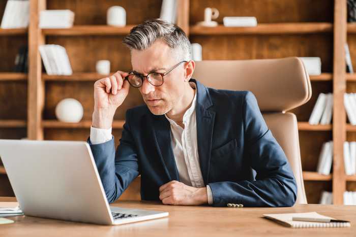 man-with-glasses-at-office
